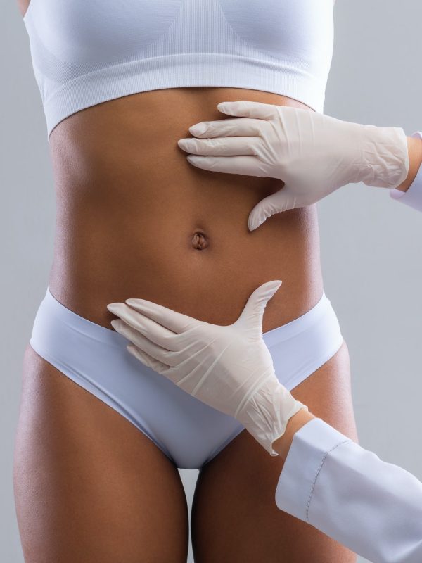 plastic-surgeon-consulting-woman-before-beauty-procedure